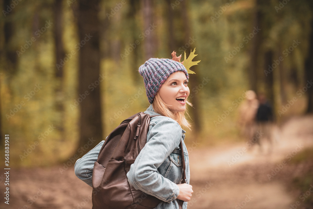 Young woman enjoying autumn weather. Young woman enjoying autumn weather.