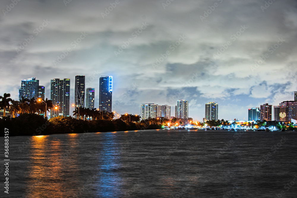 Miami City Skyline viewed from Biscayne Bay. Miami night downtown.