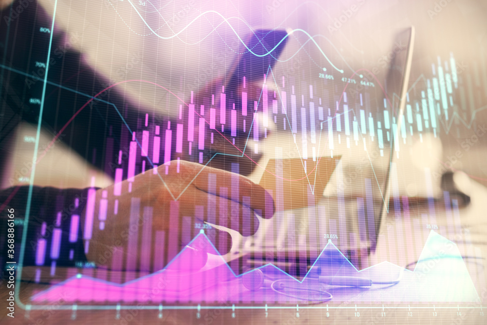 Double exposure of man's hands holding and using a phone and financial graph drawing. Analysis concept. Double exposure of man's hands holding and using a phone and financial graph drawing. Analysis concept.