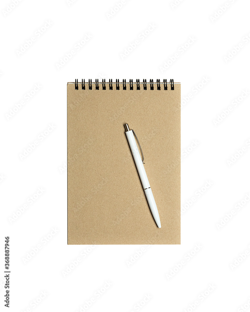 Blank spiral notepad mockup template with kraft paper cover with white glossy pen isolated on white background. Blank spiral notepad mockup template with kraft paper cover with white glossy pen isolated on white background.