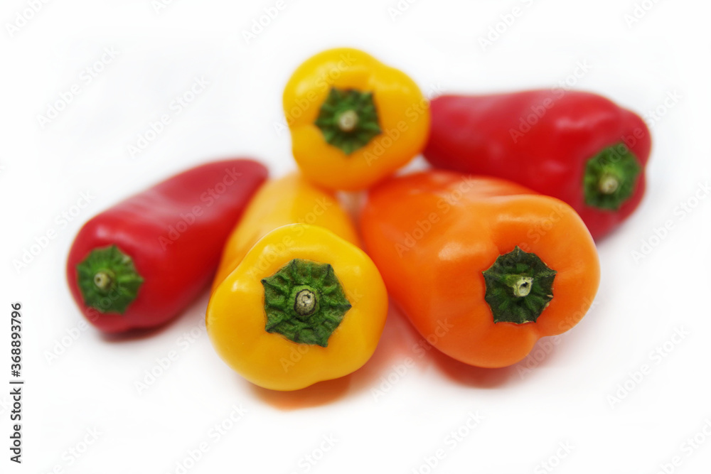 Small sweet peppers isolated on a white background. Small sweet peppers isolated on a white background.