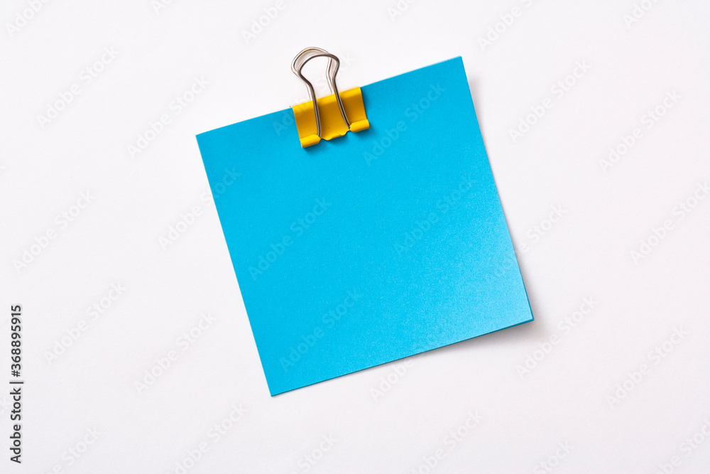 note paper and clip isolated on white background
note paper and clip isolated on white background