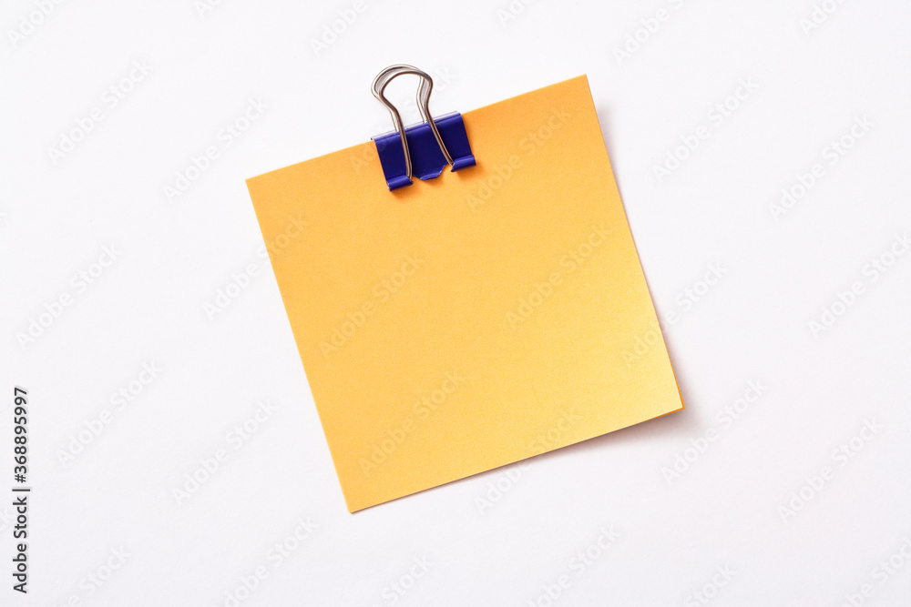 note paper and clip isolated on white background
note paper and clip isolated on white background