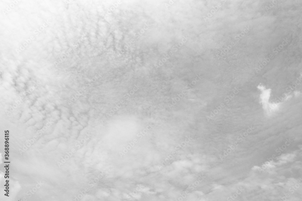 Fototapeta premium Gray sky with white clouds. Beautiful sky background and wallpaper. Concept Storm Clouds Raining.