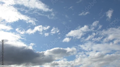 white clouds over the blue sky