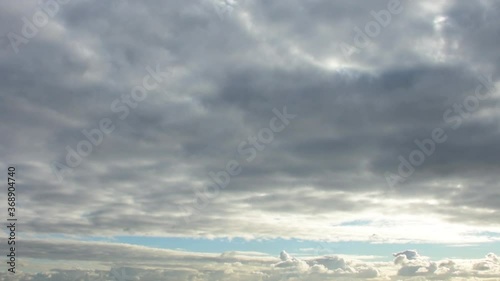 White and grey clouds on the blue sky