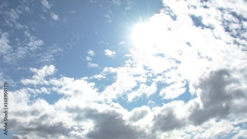 White clouds on blue sunny sky