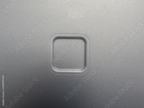 Rounded square on gray aluminum metal
