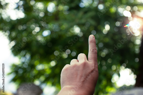 Technology, hand holding with environment Icons over the Network connection on green background.