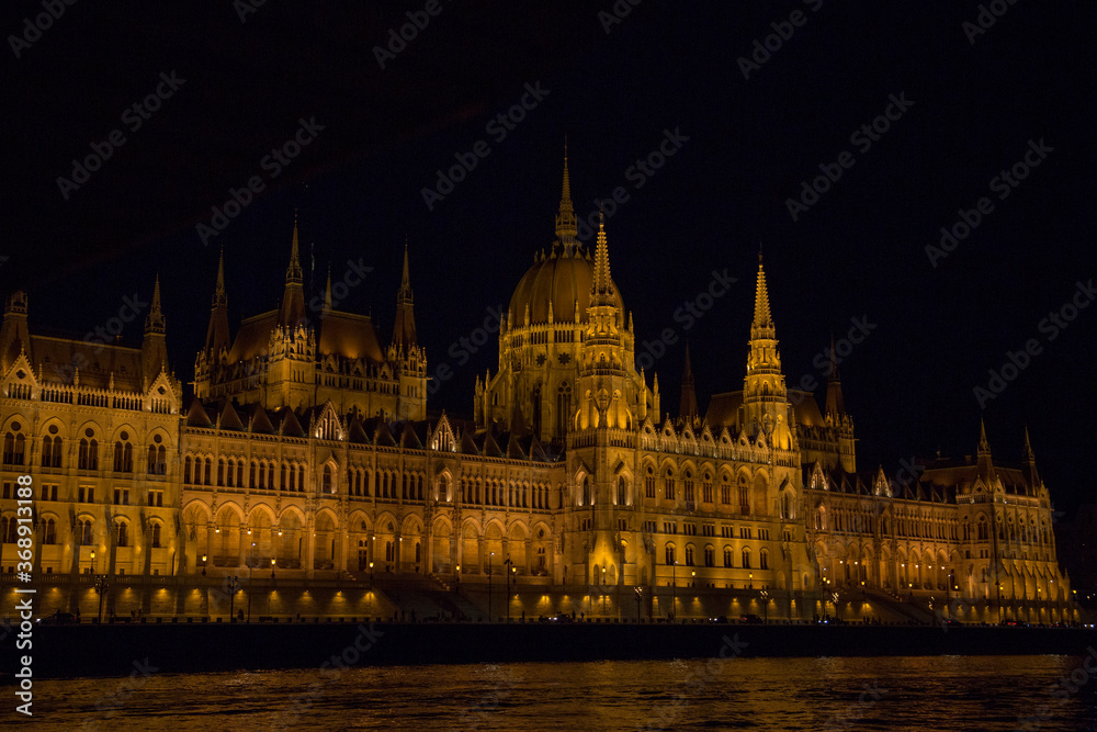 View of the building of the Hungarian Parliament in Budapest from a pleasure boat