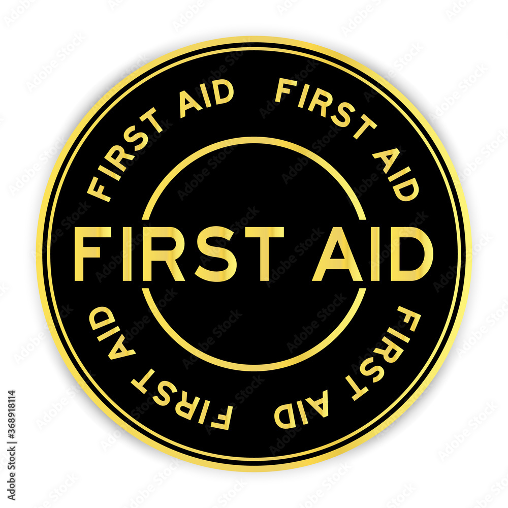 Black and gold color round sticker with word first aid on white background