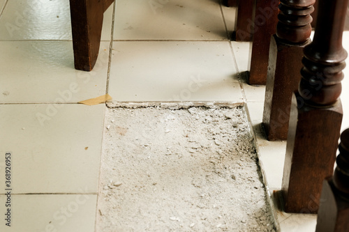 Selective focus and noise effect of damage tiles at old and abundant house