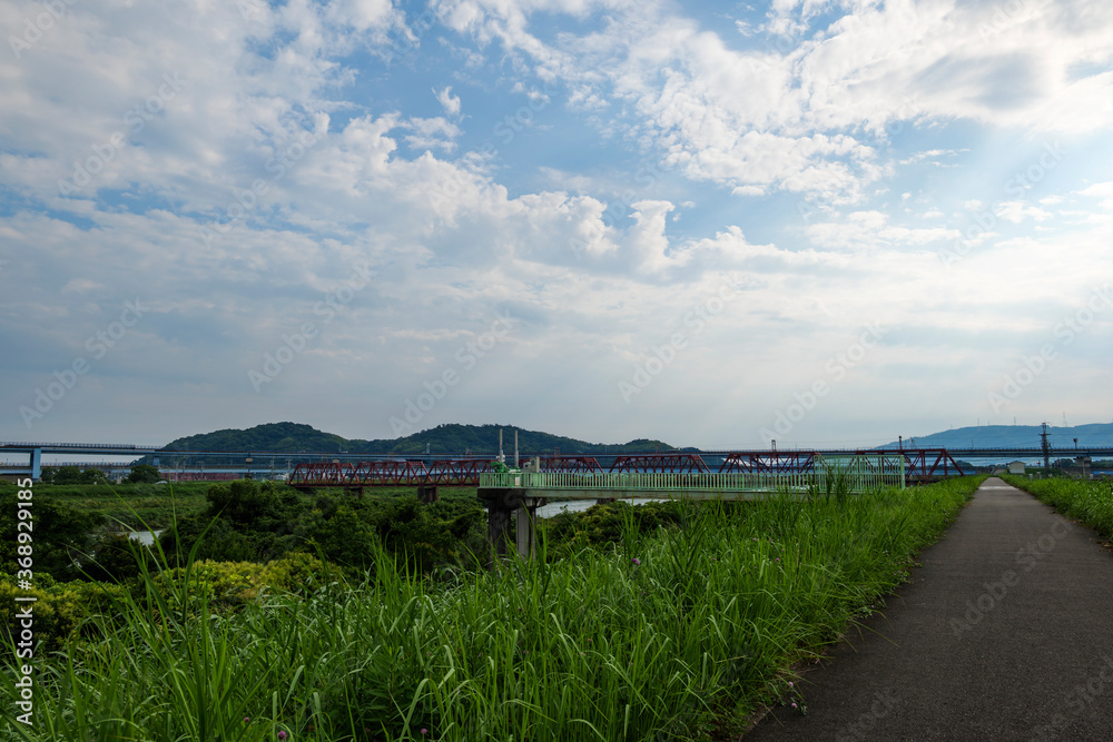 Blue sky on the banks of the Kizugawa River in Kyoto, Japan on July 19, 2020.