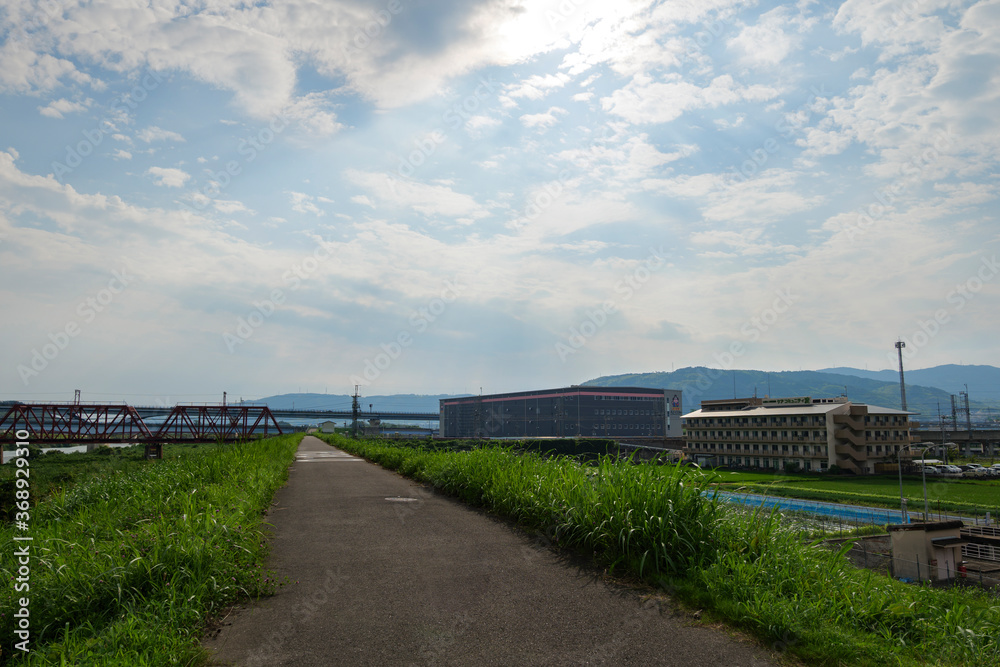 Blue sky on the banks of the Kizugawa River in Kyoto, Japan on July 19, 2020.