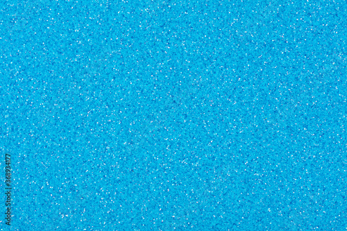 Glitter background in your gentle blue colour, wallpaper for new design.