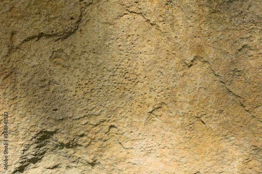 Background texture of an old wall in beige color.