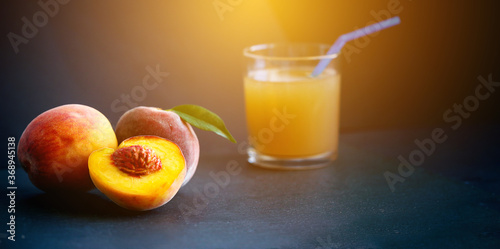 Fresh peach with peach lemonade on background. 