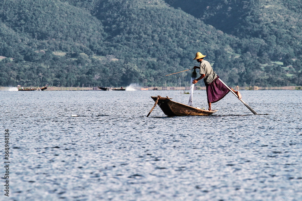 Naklejka premium Traditional one Leg Fisher on Inle Lake in Mayanmar, former Burma