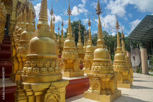 Saraburi   Thailand - July 26 2020  close up golden pagoda in rural temple for Buddhist worship