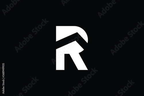 Logo design of R in vector for construction, home, real estate, building, property. creative elegant Monogram. Premium Business home logo icon. White color on black background