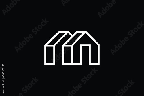 Logo design of M MM in vector for construction, home, real estate, building, property. creative elegant Monogram. Premium Business home logo icon. White color on black background