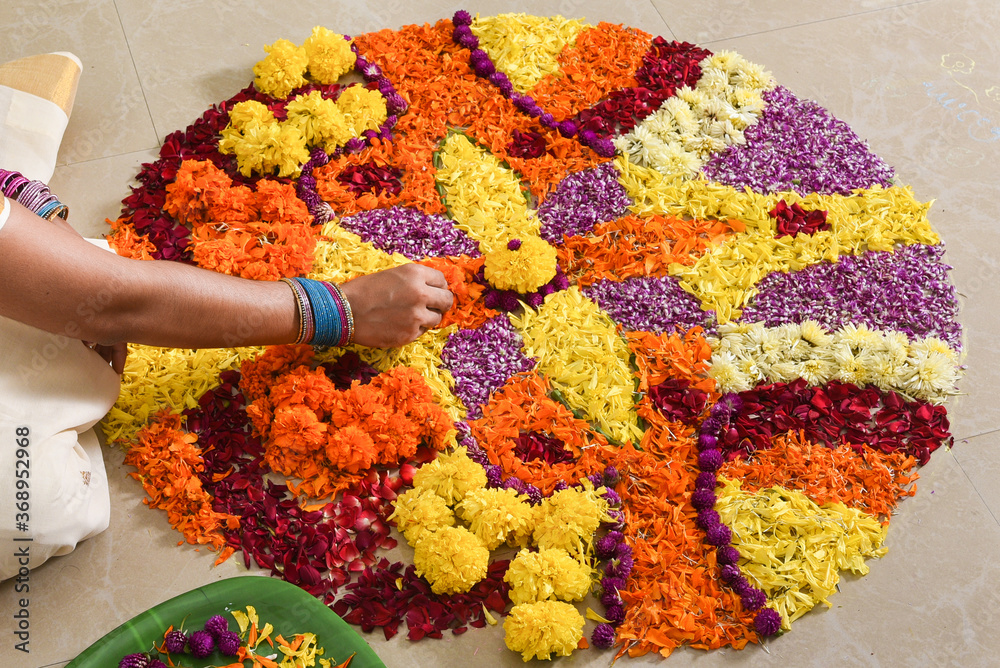 Kerala Onam festival Flower bed or Pookalam decoration, seamless floral