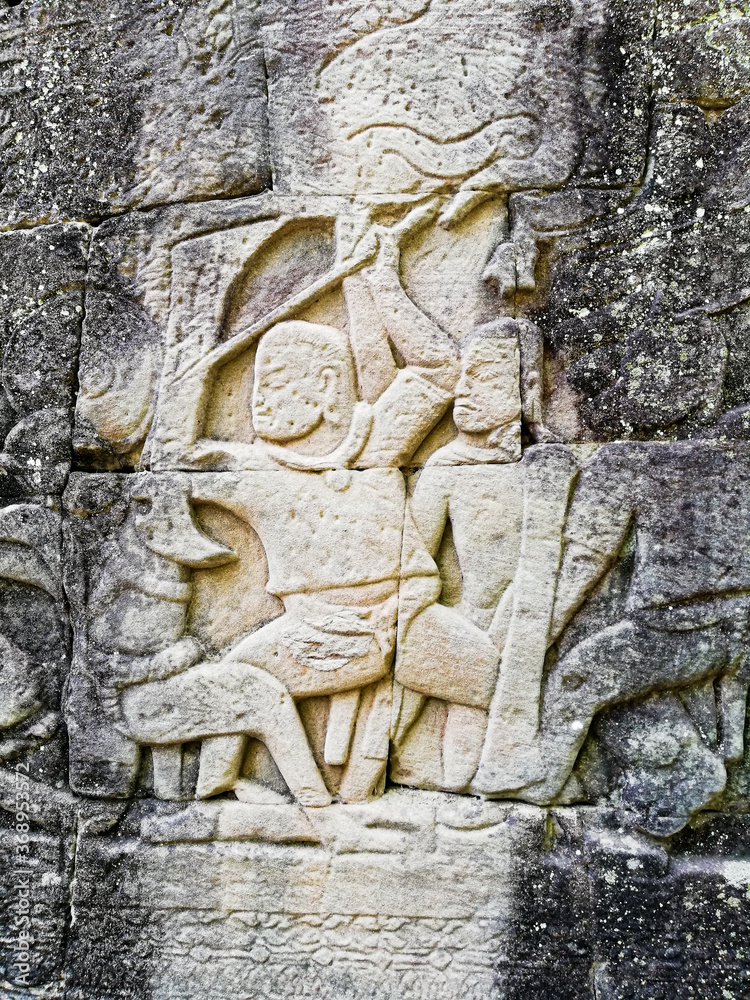 Elaborate decorative carving on temple wall. 