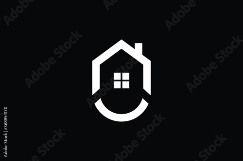 Logo design of U in vector for construction, home, real estate, building, property. creative elegant Monogram. Premium Business home logo icon. White color on black background