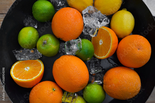 orange lime lemon ice in a bowl