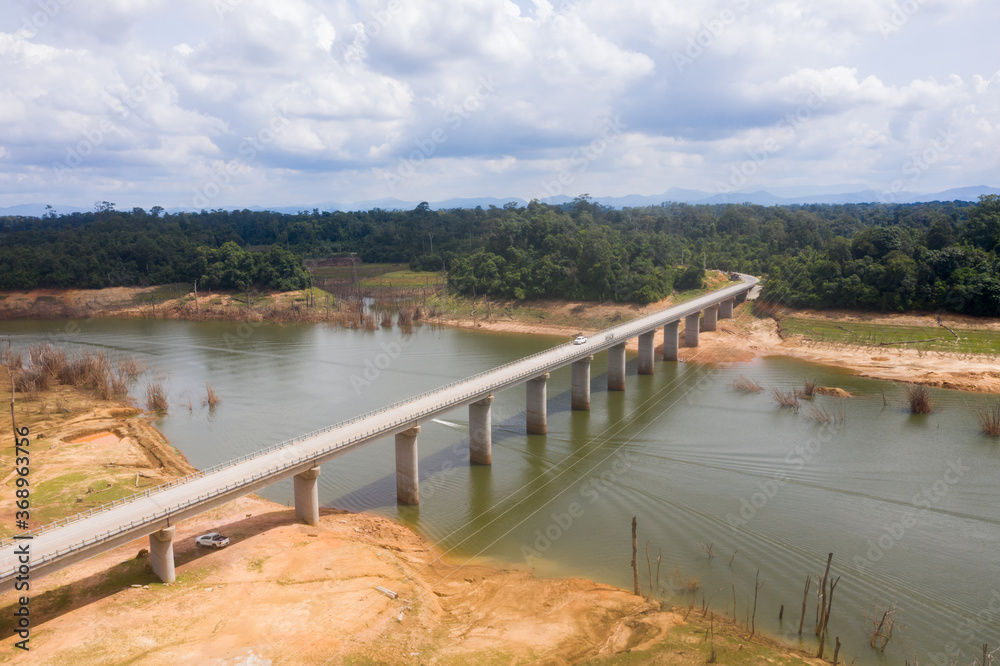 Naklejka premium arial view of bridge construction across namtheun river in Khammuan province, Lao pdr. 