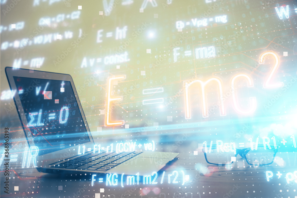 Desktop computer background and formula hologram writing. Double exposure. Education concept. Desktop computer background and formula hologram writing. Double exposure. Education concept.