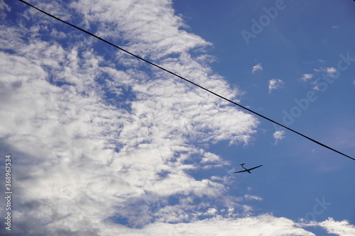 グライダーと電線と空/glider in the sky