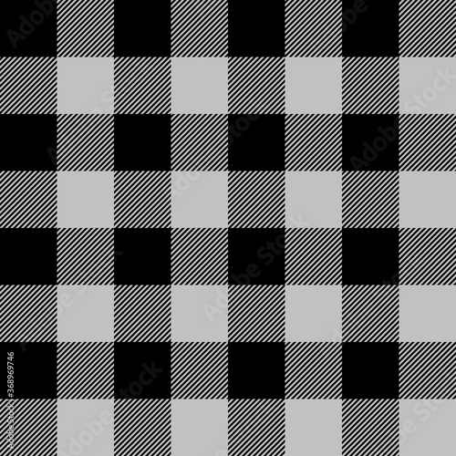 Tartan plaid. Scottish pattern in black and silver cage. Scottish cage. Traditional Scottish checkered background. Seamless fabric texture. Vector illustration