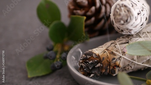 Dried white sage smudge stick, relaxation and aromatherapy. Smudging during psychic occult ceremony, herbal healing, yoga or aura cleaning. Essential incense for esoteric rituals and fortune telling