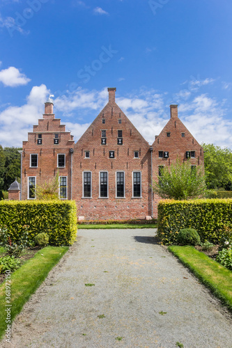 Facade of the historic Menkemaborg building in Uithuizen, Netherlands photo