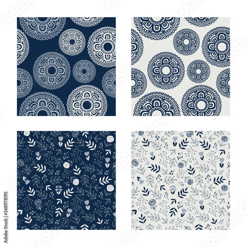 Seamless pretty indigo patterns with decorative flowers and leaves. Floral dark and bright backgrounds for textile, fabric manufacturing, wallpaper, covers, surface, print, gift wrap, scrapbooking.