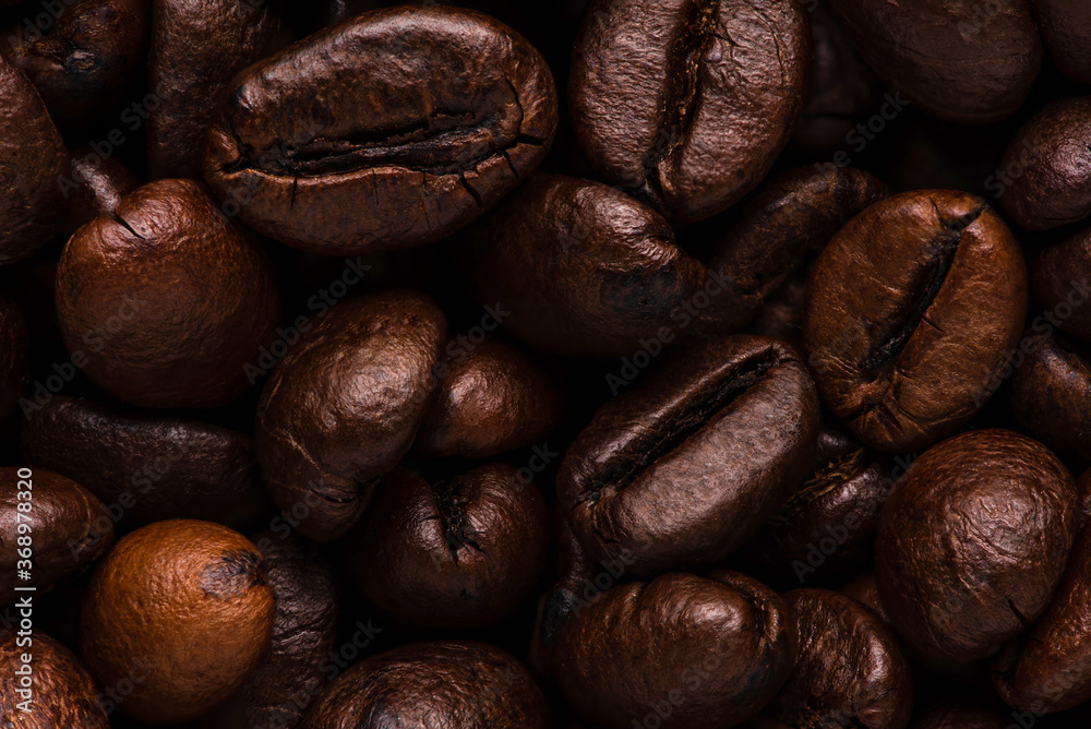 Naklejka premium abstract macro coffee bean texture background