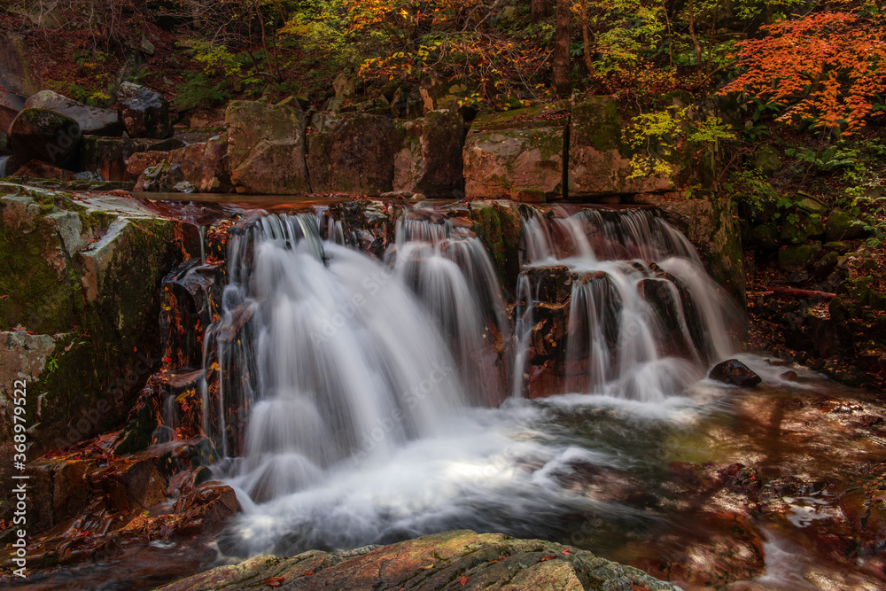 Beautiful autumn waterfall,red and yellow colorful tree leaves with stream of mountain.
C Beautiful autumn waterfall,red and yellow colorful tree leaves with stream of mountain.
C