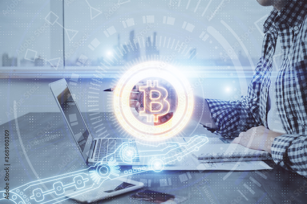 Blockchain theme hud with man working on computer on background. Concept of crypto chain. Double exposure. Blockchain theme hud with man working on computer on background. Concept of crypto chain. Double exposure.