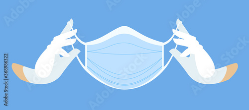 Medical mask in gloved hands. Protective face mask against viruses and bacteria. Hands in white latex gloves. professional medical care accessories.
