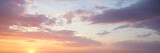 Vibrant color panoramic sun rise and sun set sky with cloud on a cloudy day.