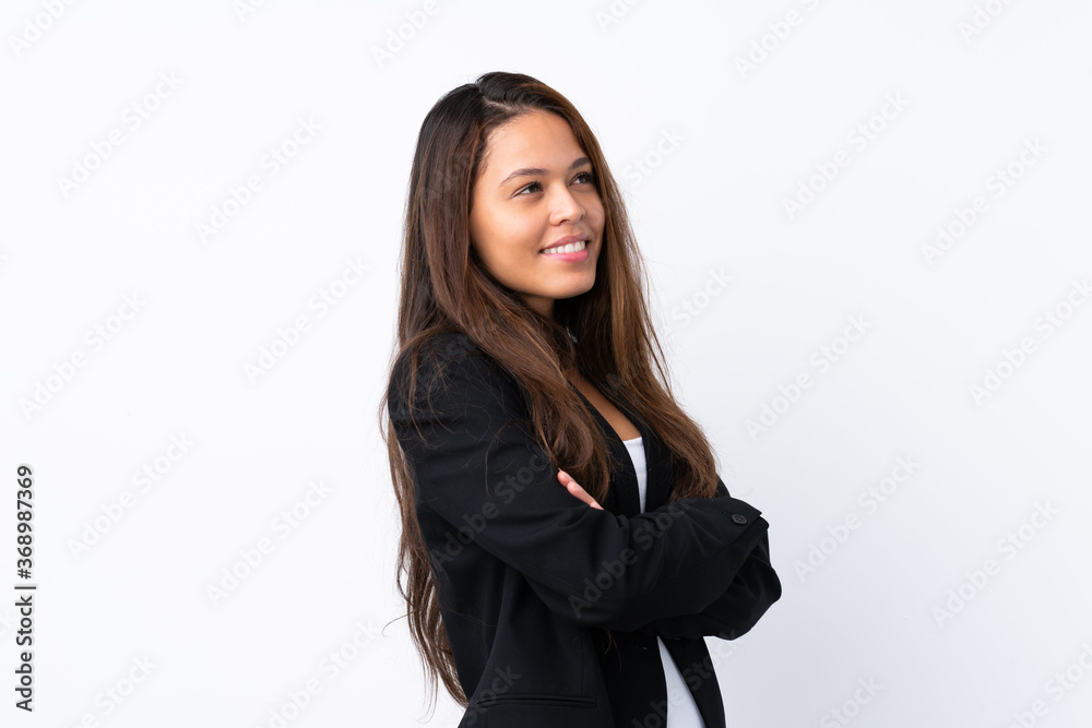 Young Brazilian girl with blazer over isolated white background looking to the side Young Brazilian girl with blazer over isolated white background looking to the side