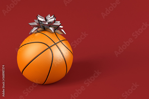 Basketball with bow ribbon gift on red background with copy space for text, Concept image for sport tournament, exercise or recreation in arena for young people. 3D rendering