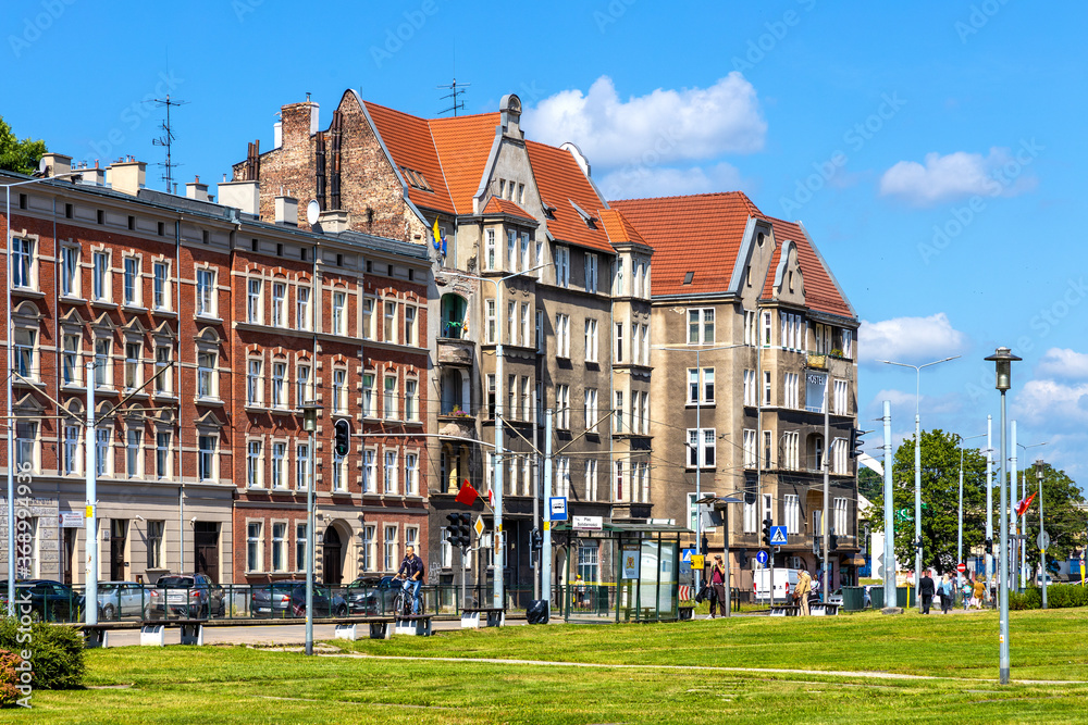 Solidarnosci square and surrounding tenement houses in old Gdansk Shipyard quarter in front of European Solidarity Centre in Gdansk, Poland