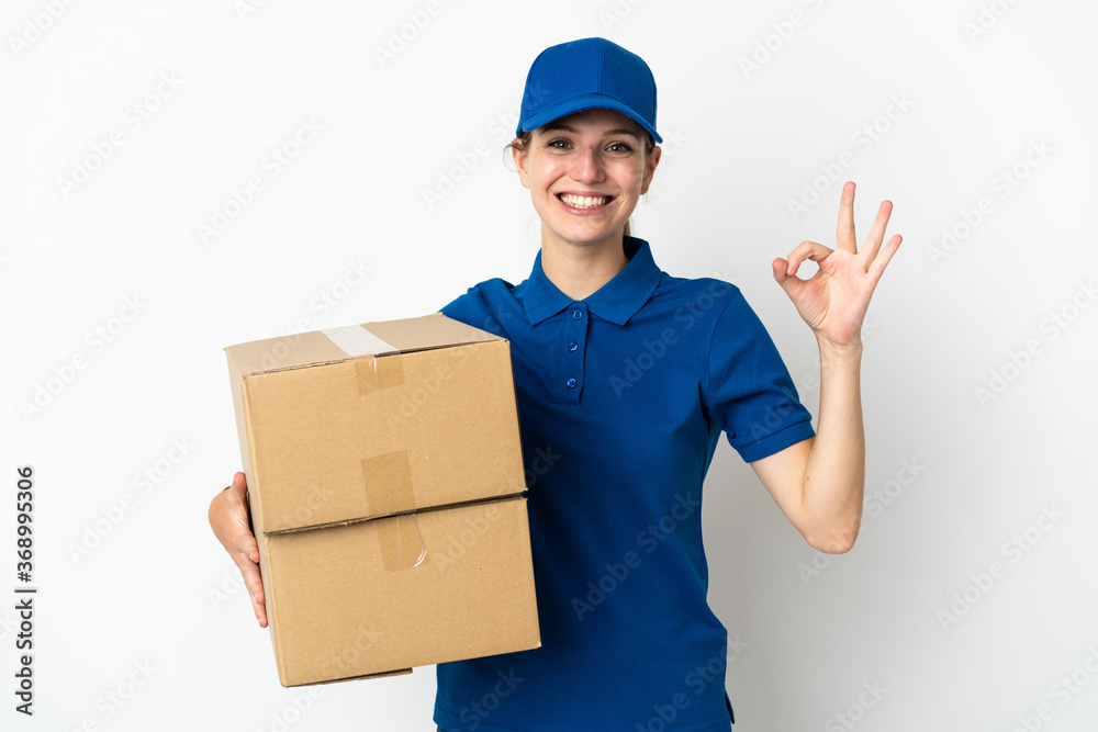 Young delivery woman isolated on white background showing ok sign with fingers Young delivery woman isolated on white background showing ok sign with fingers