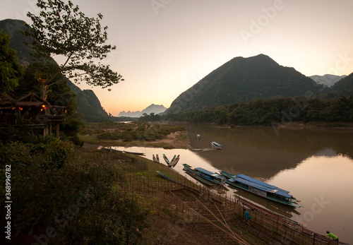 Muang Ngoi Neua Landscape, is a small riverside village in Northern Laos photo