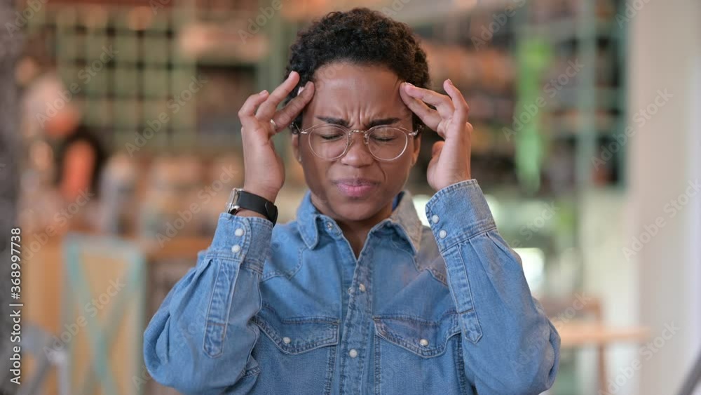 Portrait of Exhausted African Woman having Headache Portrait of Exhausted African Woman having Headache