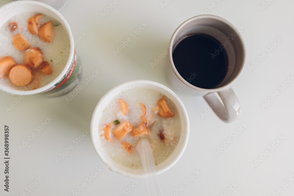 Top view of Instant rice porridge cup as simple fast breakfast. Top view of Instant rice porridge cup as simple fast breakfast.