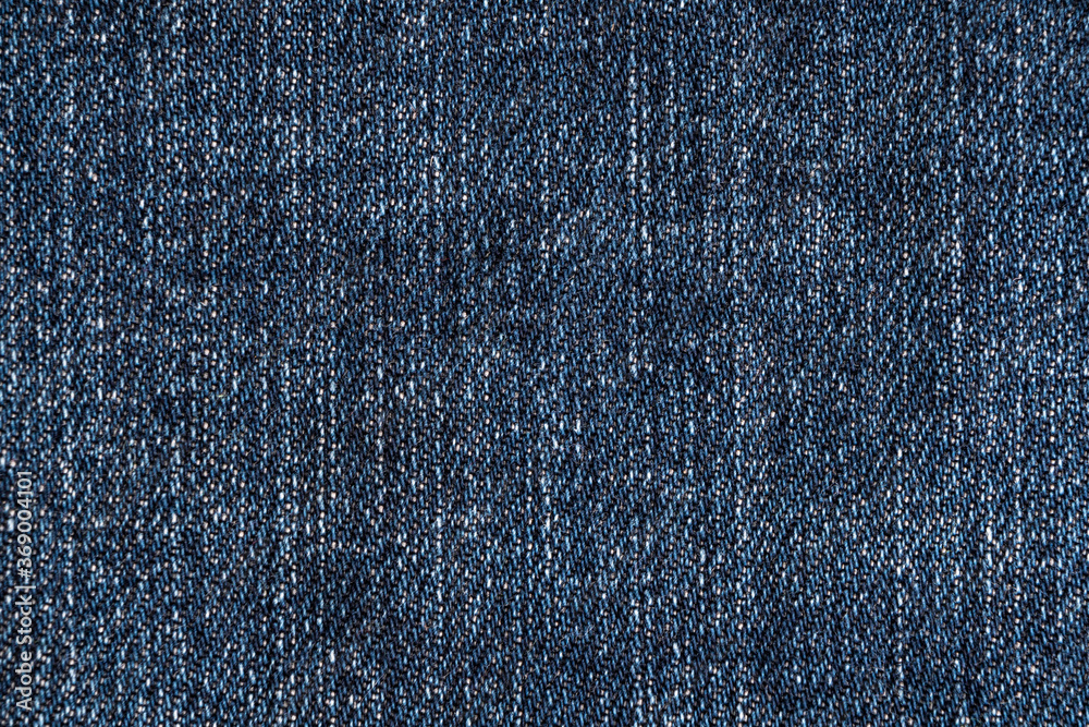 Naklejka premium Blue jeans fabric texture background. Denim jeans texture. Closeup texture and pattern of jeans fabric