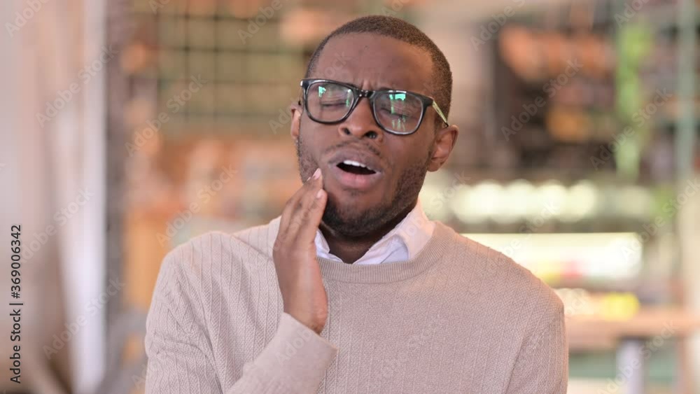 Portrait of Allergic Young African Man having Toothache